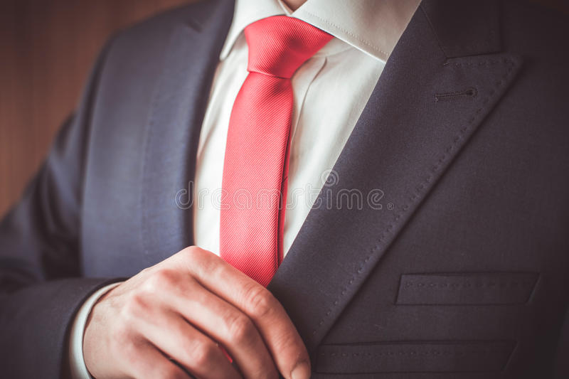 man-suit-red-tie-57149237 - IT Risk Managers